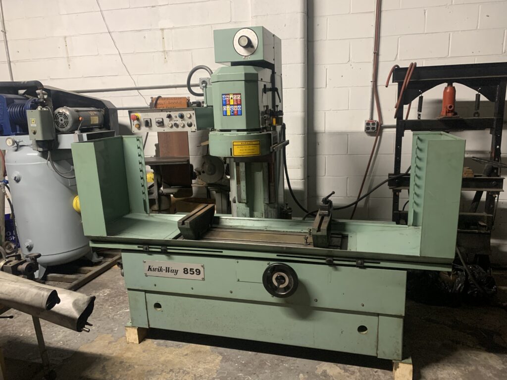 Cylinder head surfacing machine on the shop floor at Nitro Custom Works